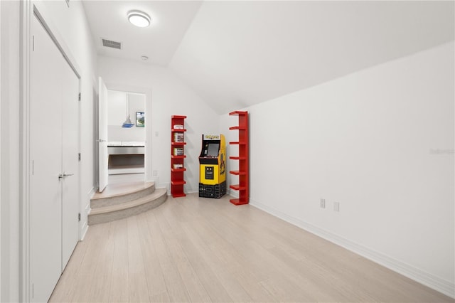 9138 Great Heron Cir, Orlando, FL 32836 - bonus room featuring light wood-style floors and vaulted ceiling