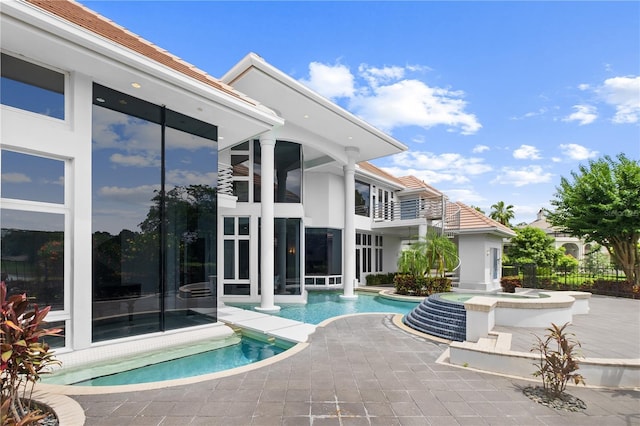 9138 Great Heron Cir, Orlando, FL 32836 - view of pool with a pool with connected hot tub and a patio area