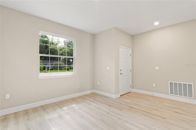 3672 Rollin O Ln, Apopka, FL 32703 - spare room featuring wood finished floors, baseboards, and recessed lighting