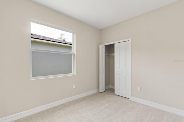 3672 Rollin O Ln, Apopka, FL 32703 - unfurnished bedroom featuring carpet, baseboards, and a closet