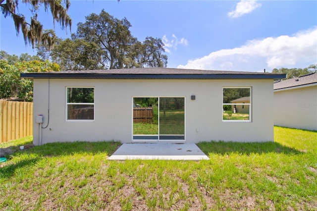 3672 Rollin O Ln, Apopka, FL 32703 - rear view of house with a patio and stucco siding