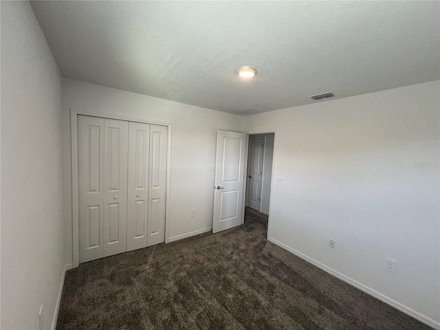 930 Cattleman St, Winter Haven, FL 33881 - unfurnished bedroom featuring baseboards, carpet floors, and a closet