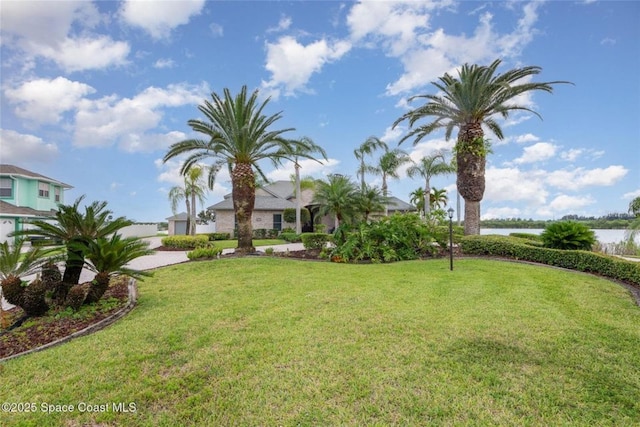 1175 Tuckaway Dr, Rockledge, FL 32955 - view of grassy yard featuring a water view