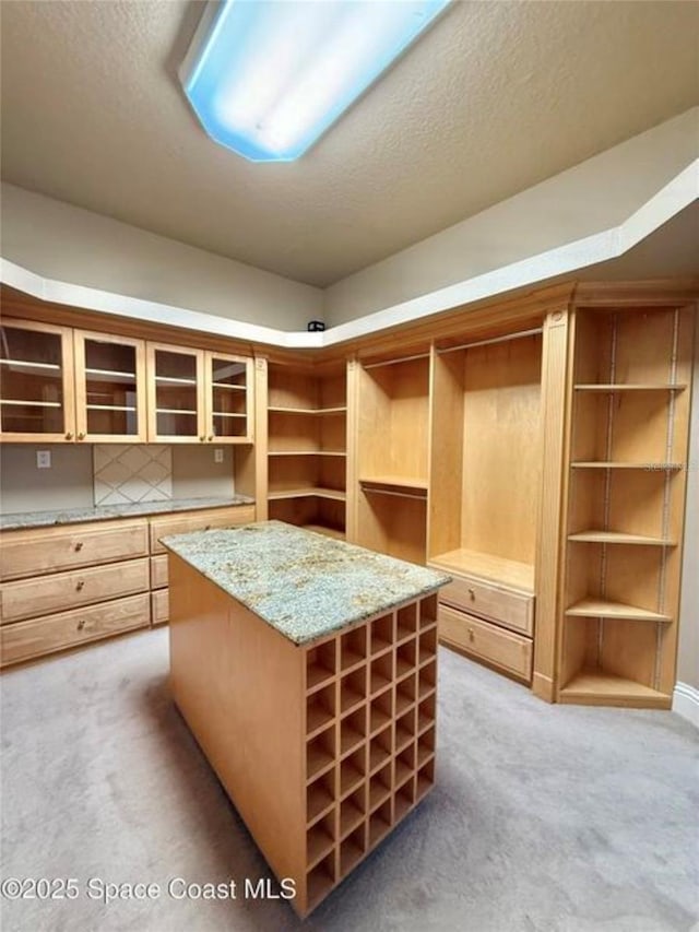 1175 Tuckaway Dr, Rockledge, FL 32955 - walk in closet featuring light carpet