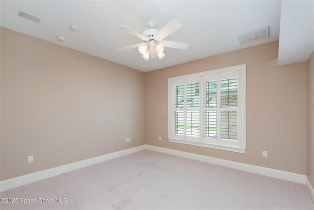 1175 Tuckaway Dr, Rockledge, FL 32955 - spare room featuring carpet, ceiling fan, and baseboards