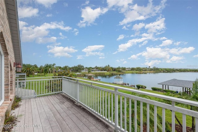 1175 Tuckaway Dr, Rockledge, FL 32955 - wooden deck with a water view