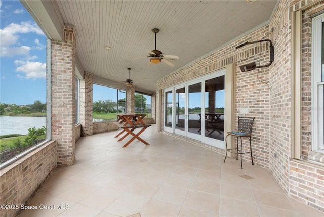 1175 Tuckaway Dr, Rockledge, FL 32955 - view of patio featuring a water view and a ceiling fan