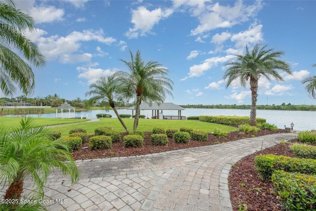 1175 Tuckaway Dr, Rockledge, FL 32955 - view of community featuring a gazebo, a water view, and a yard