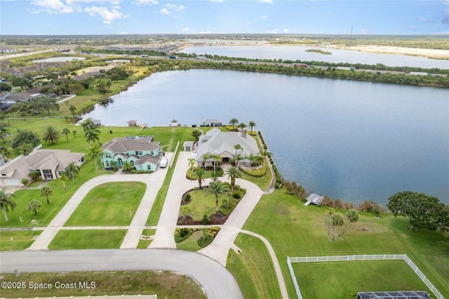 1175 Tuckaway Dr, Rockledge, FL 32955 - aerial overview of property's location featuring a large body of water and nearby suburban area