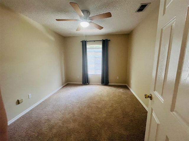 830 Moonlit Ln, Casselberry, FL 32707 - spare room with carpet floors, a ceiling fan, a textured ceiling, and baseboards