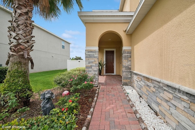 2659 Magpie Way, Sanford, FL 32773 - view of exterior entry with stucco siding and stone siding