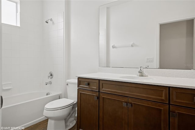 2659 Magpie Way, Sanford, FL 32773 - bathroom with vanity, toilet, bathing tub / shower combination, and wood finished floors