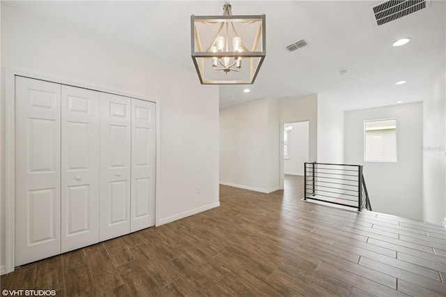 2659 Magpie Way, Sanford, FL 32773 - unfurnished dining area featuring wood finished floors, a chandelier, baseboards, and recessed lighting