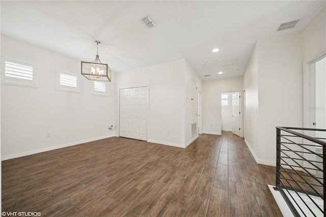 2659 Magpie Way, Sanford, FL 32773 - spare room with dark wood-type flooring, a chandelier, baseboards, and recessed lighting