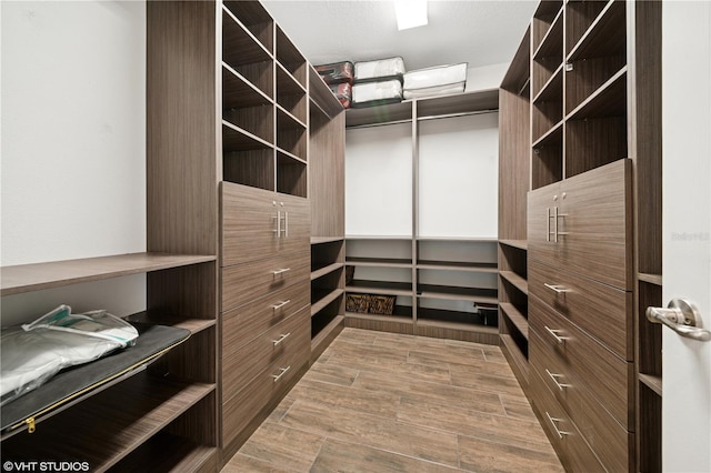 2659 Magpie Way, Sanford, FL 32773 - spacious closet with wood finished floors