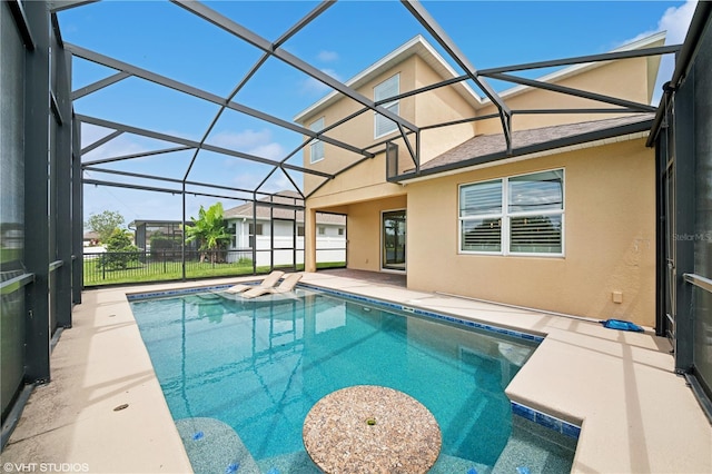 2659 Magpie Way, Sanford, FL 32773 - view of swimming pool featuring a patio area, glass enclosure, and a hot tub