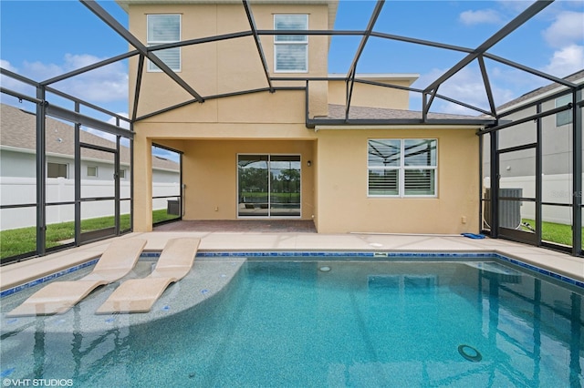 2659 Magpie Way, Sanford, FL 32773 - view of pool featuring glass enclosure, a patio area, and cooling unit