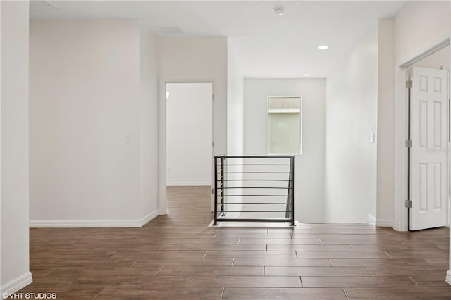2659 Magpie Way, Sanford, FL 32773 - spare room featuring wood finished floors, baseboards, a smoke detector, and recessed lighting