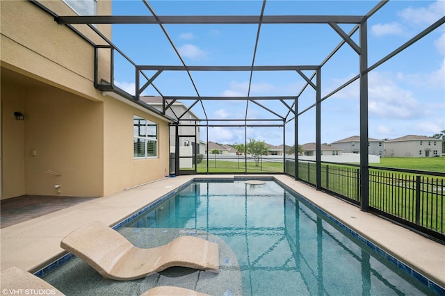 2659 Magpie Way, Sanford, FL 32773 - view of swimming pool featuring a patio area, a residential view, a yard, and glass enclosure