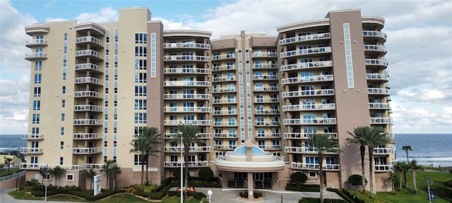 1925 S Atlantic Ave Unit 411, Daytona Beach, FL 32118 - view of apartment building / complex with a water view