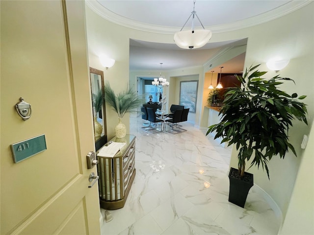 1925 S Atlantic Ave Unit 411, Daytona Beach, FL 32118 - corridor featuring a chandelier, crown molding, marble finish flooring, and baseboards