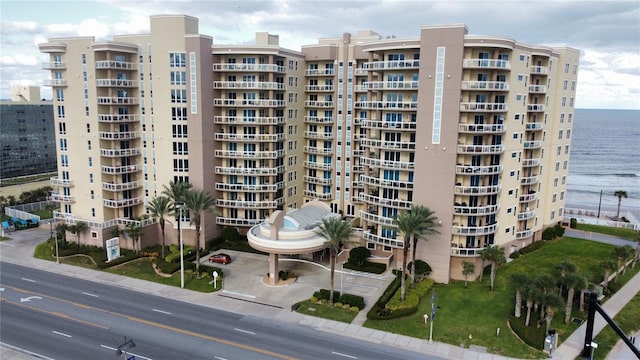 1925 S Atlantic Ave Unit 411, Daytona Beach, FL 32118 - view of apartment building / complex featuring a water view