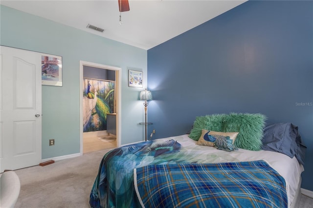 730 Siena Palm Dr Unit 201, Celebration, FL 34747 - bedroom with carpet flooring, baseboards, a ceiling fan, and connected bathroom