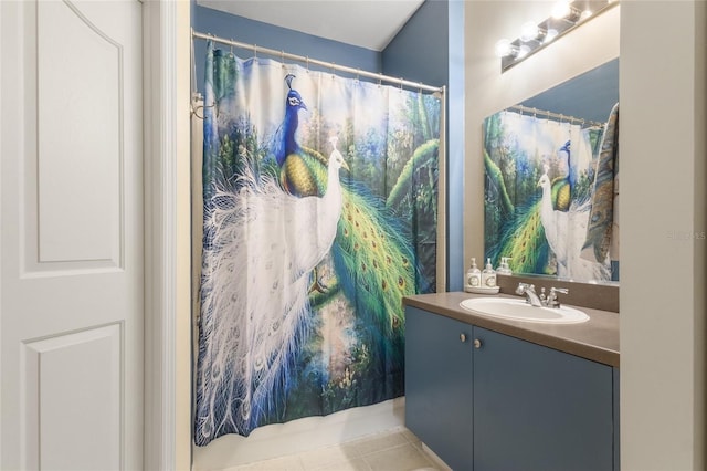 730 Siena Palm Dr Unit 201, Celebration, FL 34747 - bathroom featuring vanity, tile patterned flooring, and a shower with curtain