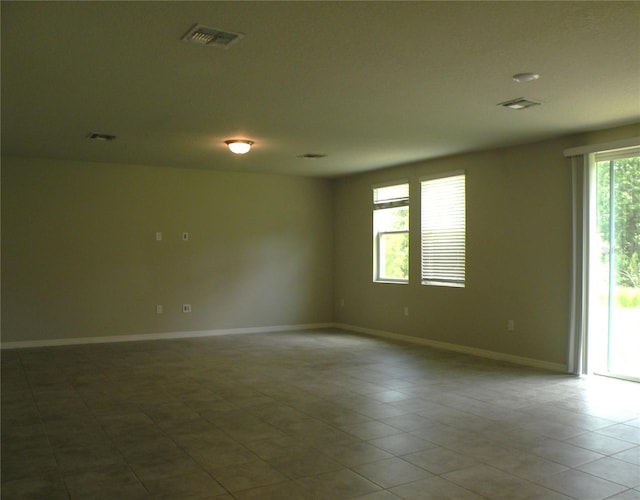17305 Cagan Crossings Blvd, Clermont, FL 34714 - empty room with baseboards and tile patterned floors