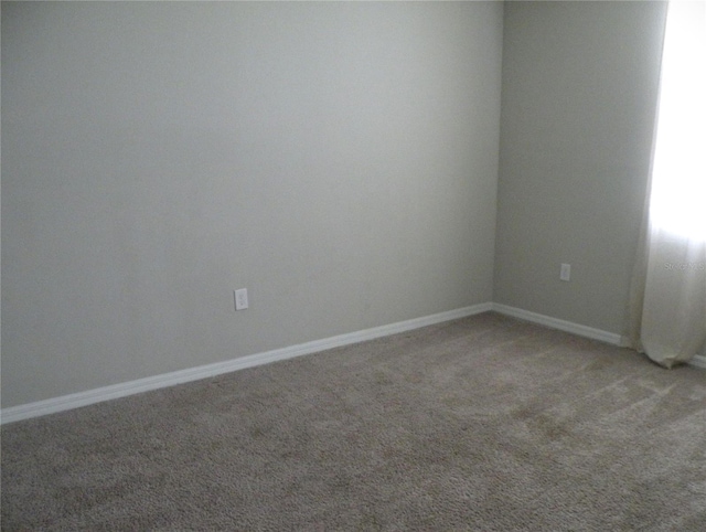 17305 Cagan Crossings Blvd, Clermont, FL 34714 - spare room featuring light carpet and baseboards