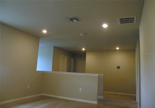 17305 Cagan Crossings Blvd, Clermont, FL 34714 - unfurnished room with light colored carpet, recessed lighting, and baseboards