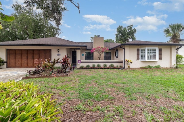 7058 Archwood Dr, Orlando, FL 32819 - single story home with an attached garage, a chimney, stucco siding, concrete driveway, and a front yard