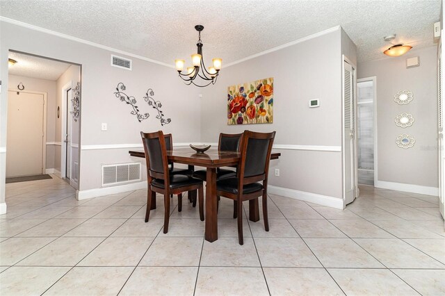 7058 Archwood Dr, Orlando, FL 32819 - dining space featuring a textured ceiling, a chandelier, light tile patterned flooring, ornamental molding, and baseboards