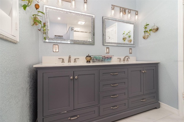 7058 Archwood Dr, Orlando, FL 32819 - full bathroom with double vanity and baseboards