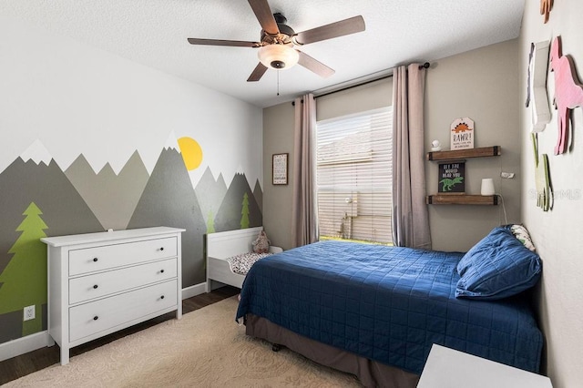 610 Strihal Loop, Oakland, FL 34787 - bedroom with light wood-style flooring, baseboards, and a ceiling fan