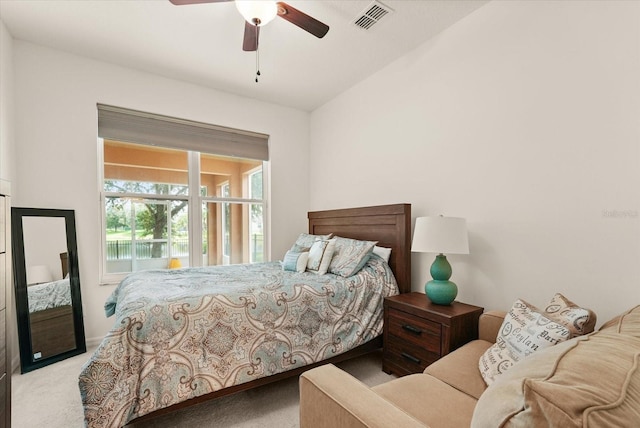 1613 Water Elm Ct, Orlando, FL 32825 - carpeted bedroom with vaulted ceiling and a ceiling fan