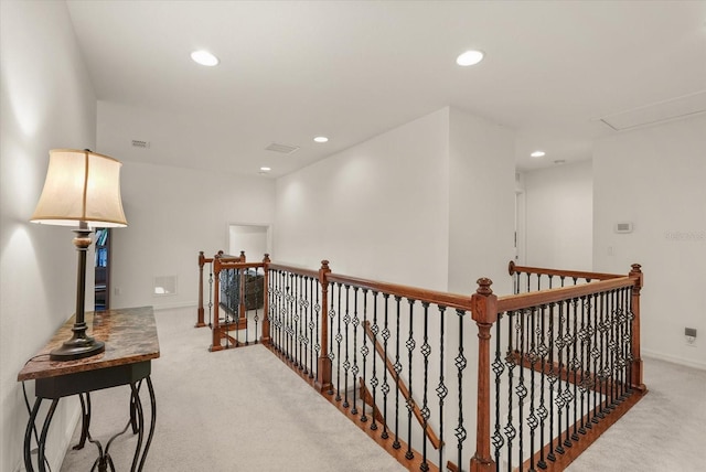 1613 Water Elm Ct, Orlando, FL 32825 - hall with an upstairs landing, light carpet, and recessed lighting
