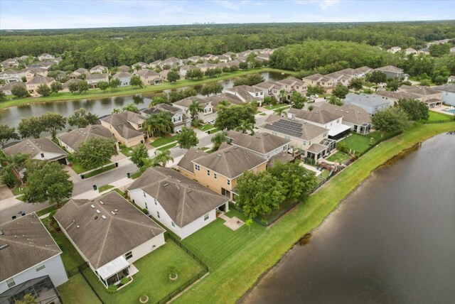 1613 Water Elm Ct, Orlando, FL 32825 - aerial view of residential area with a large body of water and a forest