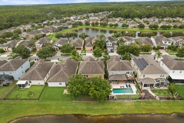 1613 Water Elm Ct, Orlando, FL 32825 - aerial view of residential area with a nearby body of water and a forest