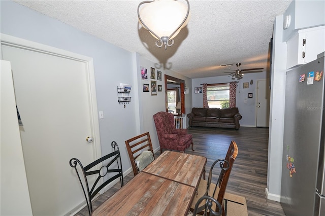 881 Cedar Cir, Tavares, FL 32778 - dining space with a ceiling fan, a textured ceiling, dark wood-style flooring, and baseboards