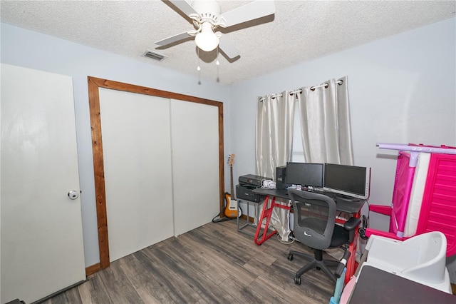 881 Cedar Cir, Tavares, FL 32778 - office with wood finished floors, a ceiling fan, and a textured ceiling