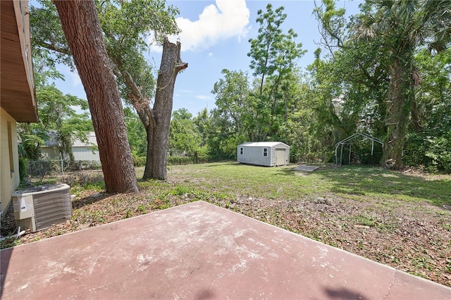881 Cedar Cir, Tavares, FL 32778 - view of green lawn featuring a patio area and central air condition unit