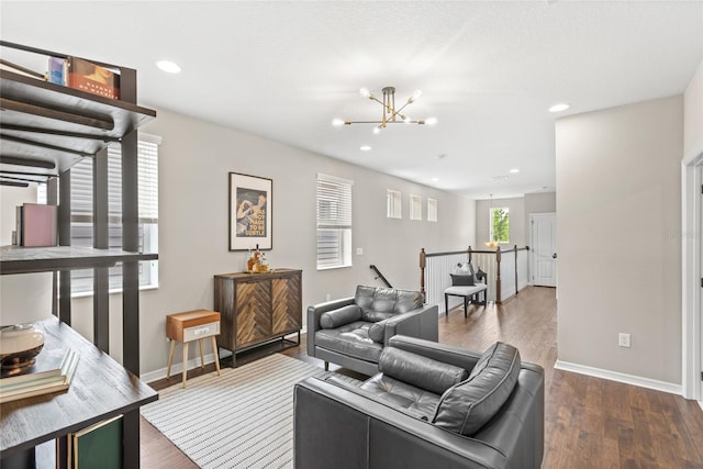 16013 Tollington Aly, Winter Garden, FL 34787 - living room with a chandelier, baseboards, dark wood-style floors, and recessed lighting