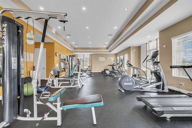 15477 Blackbead St, Winter Garden, FL 34787 - exercise room featuring recessed lighting, a raised ceiling, and baseboards