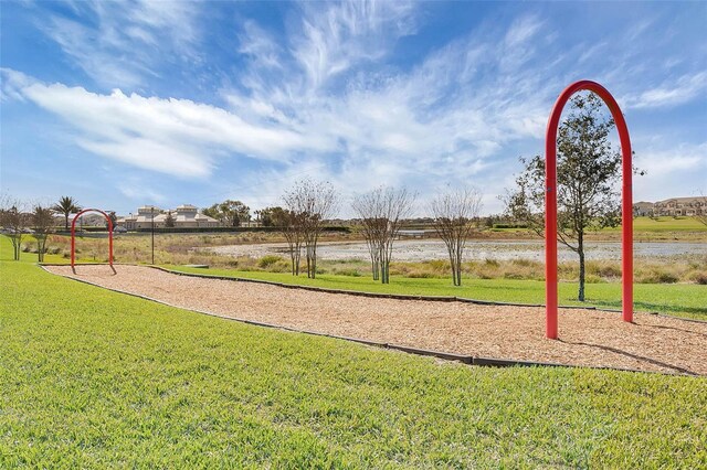 15477 Blackbead St, Winter Garden, FL 34787 - view of jungle gym with a yard and a water view