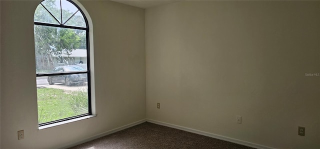 2008 Juniper Dr, Edgewater, FL 32141 - unfurnished room with dark colored carpet and baseboards