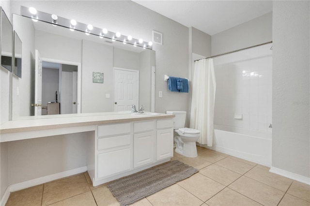 2821 Almaton Loop Unit 105, Kissimmee, FL 34747 - full bathroom featuring toilet, tile patterned flooring, vanity, and shower / bath combo with shower curtain