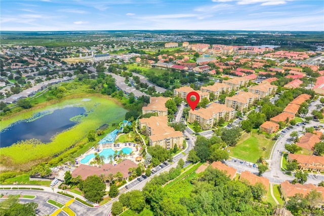2821 Almaton Loop Unit 105, Kissimmee, FL 34747 - view of property location with a large body of water and a pool