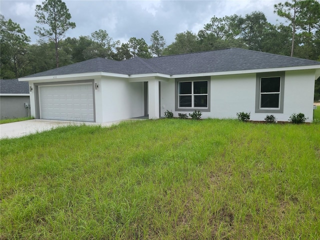 4333 SW 157th Ter, Ocala, FL 34481 - single story home featuring a garage, a front yard, concrete driveway, roof with shingles, and stucco siding