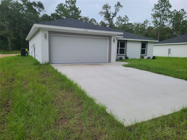 4333 SW 157th Ter, Ocala, FL 34481 - ranch-style house featuring stucco siding, concrete driveway, a front lawn, an attached garage, and central AC unit